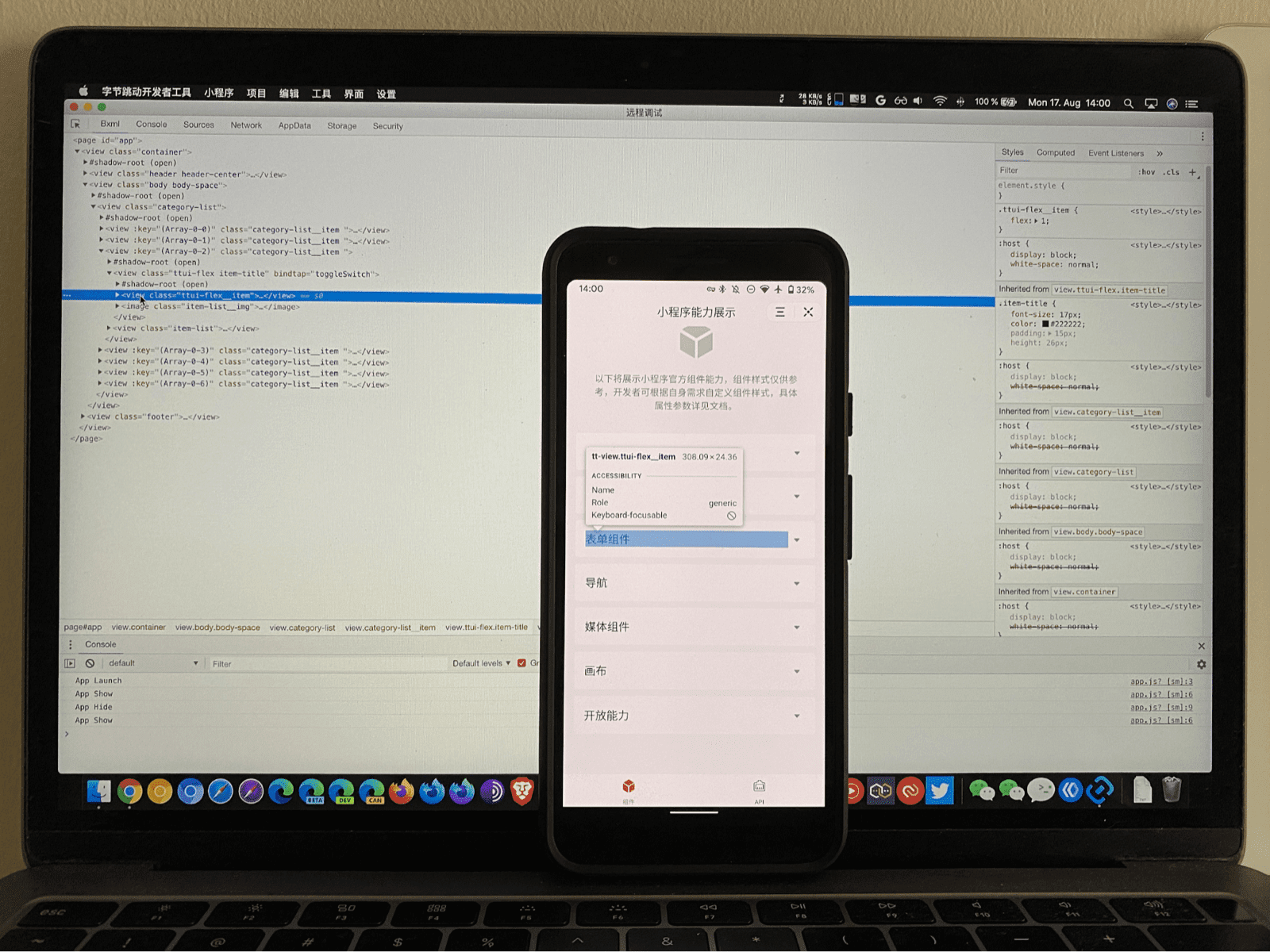 A mobile phone running a mini app with parts of the UI highlighted by the ByteDance DevTools debugger running on a laptop inspecting it.
