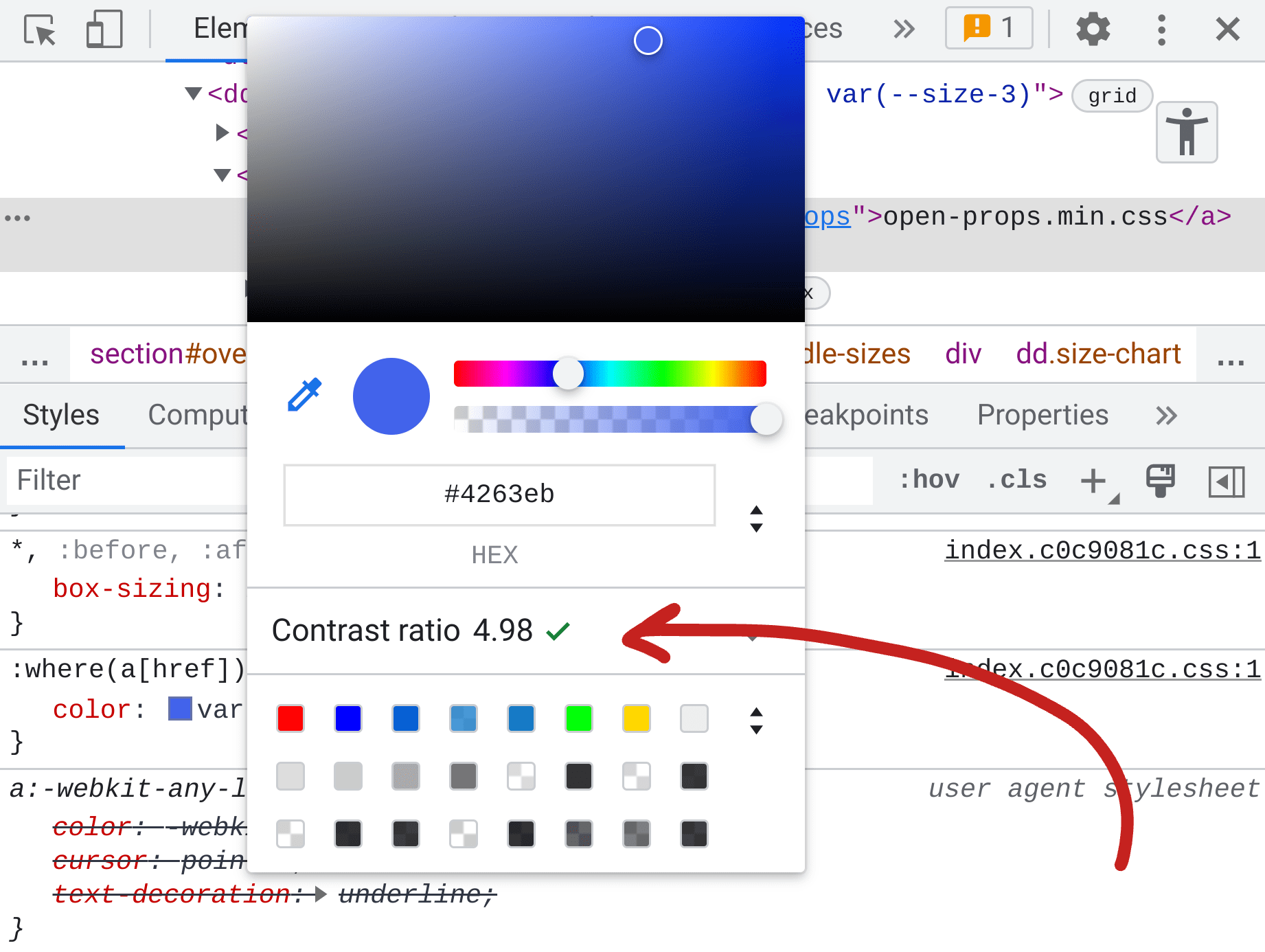 Screenshot of DevTools Elements panel, in the styles the color picker is shown and in the middle is reporting the contrast ratio of the color of 4.98.