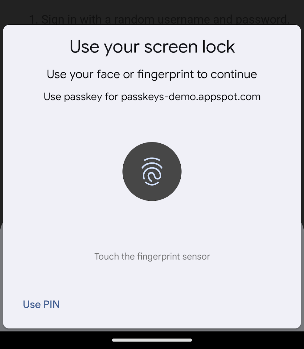 Chrome for Android のユーザー確認ダイアログのスクリーンショット。このダイアログでは、顔認識や指紋認証を使用して本人確認を行うようユーザーに求め、認証をリクエストしているオリジンを表示します。左下に、PIN を使用したオーナー確認のオプションがあります。