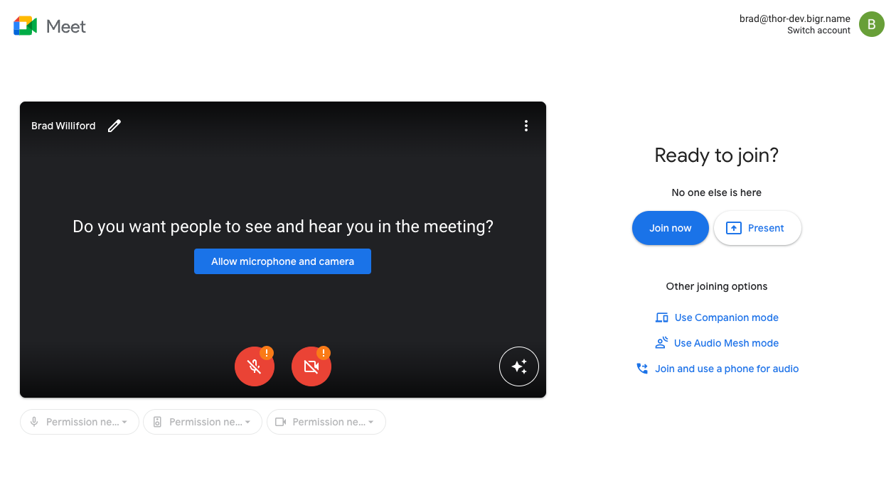 The Google Meet app in an ongoing meeting that the user has joined without allowing camera and microphone access. A button in the center offers the user the option to allow access to both.