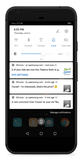 A smartphone displaying OpenSooq notifications.