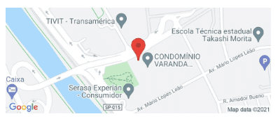 صورة تعرض منطقة حضرية في &quot;خرائط Google&quot; مع علامة حمراء في المنتصف