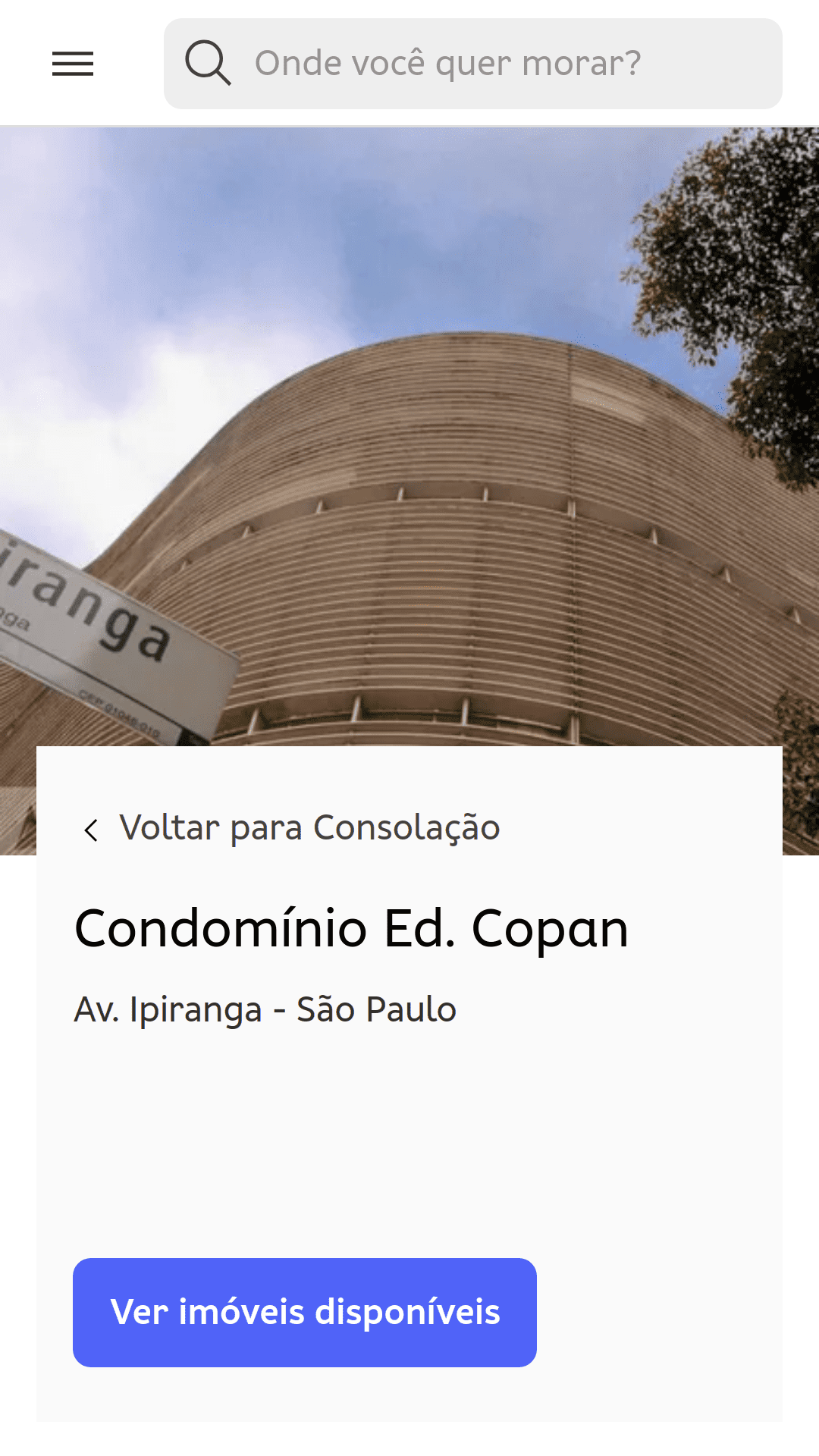 The condominium page for Edifício Copan (São Paulo, Brazil). A photo taken from the ground level shows the curves of the building structure.
